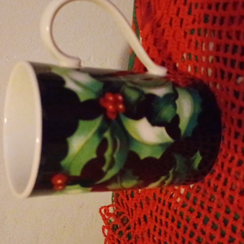Holly design Dunoon stoneware coffee cup by Caroline Bessy, made in Scotland.